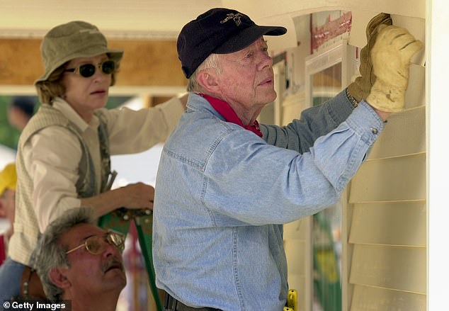 After his presidency, the Carters started working with Habitat for Humanity, a Christian nonprofit that builds affordable houses for those in need. The Carters contributed financially to the international organization, and  helped build homes since 1984. Above, Rosalynn and Jimmy Carter attach siding to a Habitat for Humanity home in LaGrange, Georgia in June 2003