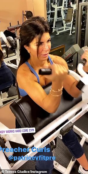 Building strength: Teresa focused intently as she did preacher curls in her outing