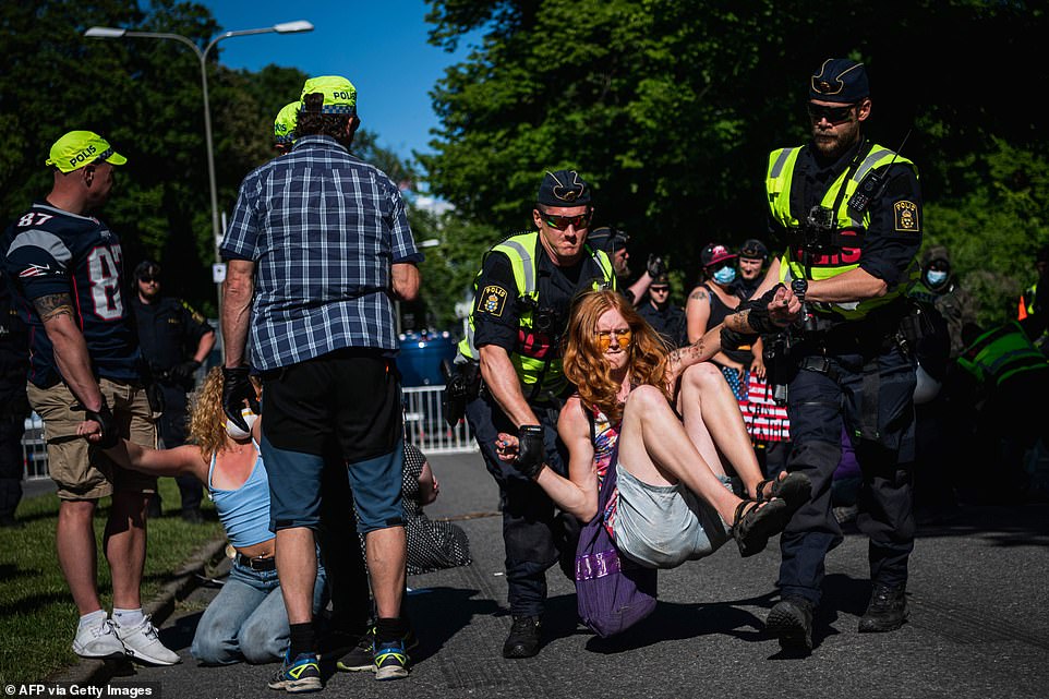 Yesterday, Black Lives Matter protesters were moved by police during a demonstration in Stockholm, Sweden, as unrest continued this weekend