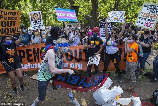 A birthday 'cake' was smashed into pieces by protesters calling for racial justice