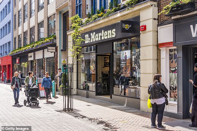 Kenny Wilson, chief executive of Dr Martens, said it was 'morally right' to return the funds it claimed after furloughing staff at its UK stores and manufacturing site. Pictured: stock image