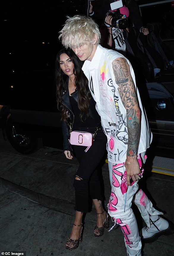 Opening up: Despite any behind-the-scenes drama, Megan and MGK's romance pushed on and the rocker openly discussed their relationship during an appearance on the Howard Stern Show; Megan and MGK pictured in September 2020