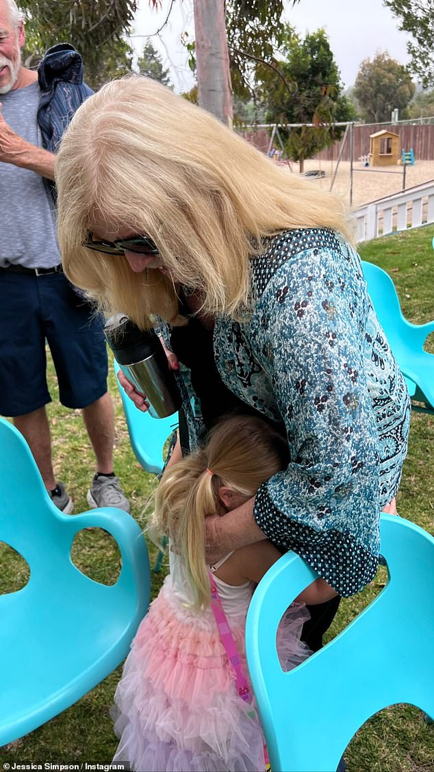 All love! Birdie seen hugging a family member at the celebration