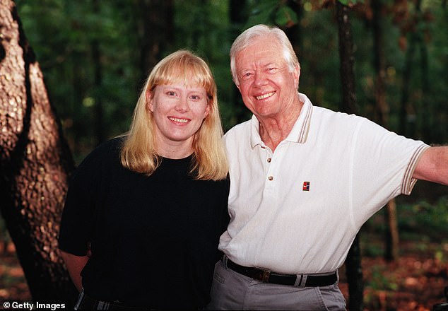 Amy, now 57, became known for her activism in her adult years, participating in numerous protests against the US' foreign policy. She is seen in 1995 with her grandfather