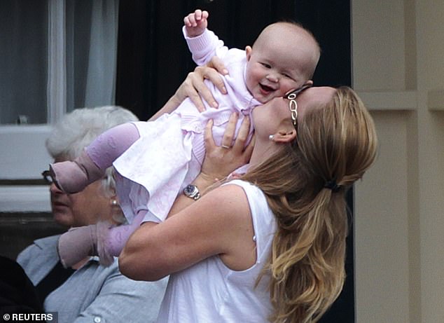 Peter Phillips now ex-wife Autumn gave birth to their first daughter Savannah Phillips on December 29, 2010, at Gloucestershire Royal Hospital, weighing 8lbs 8oz. Pictured: Autumn Phillips kissing her daughter Savannah in 2011