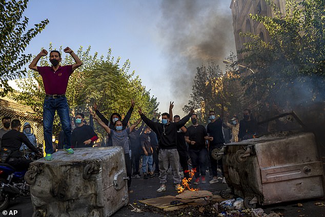 Iranians protests the death of 22-year-old Mahsa Amini after she was detained by the morality police, October 27. 2022