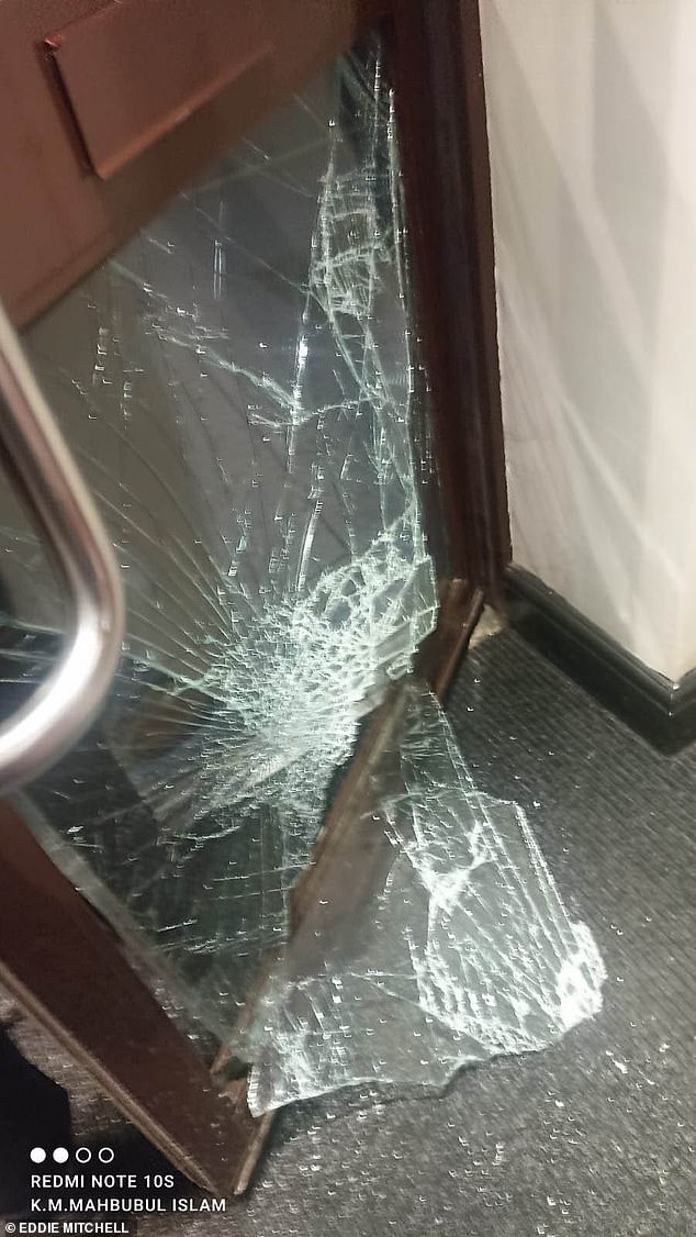 The attack on local business Passage to India saw windows smashed - two people have been arrested