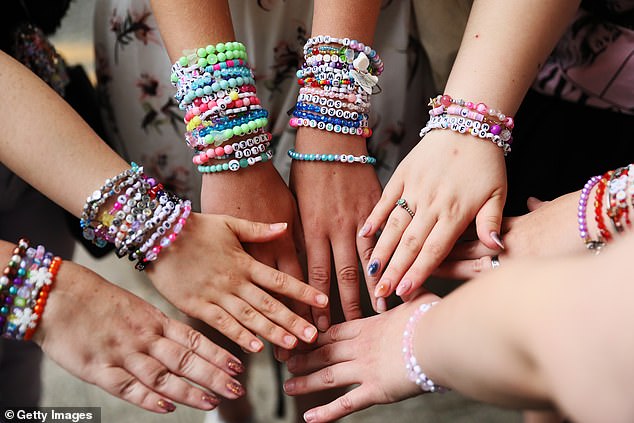 The younger fans, still with their gauntlets of friendship bracelets, were palpitating with excitement as they bellowed the lyrics