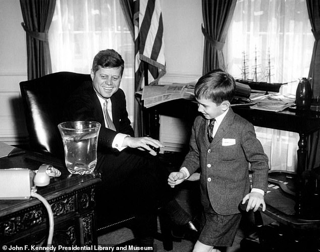 A young Robert F. Kennedy Jr. (right) with his uncle, President John F. Kennedy (left) in 1961. RFK Jr. left the Democratic Party in October and on Friday endorsed the Republican nominee, former President Donald Trump