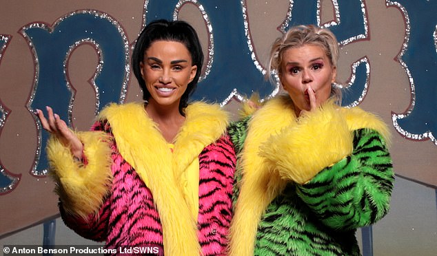 First look pictures of the pair dressed up as the iconic characters showed Katie sporting a fluffy pink and black tiger print robe with a yellow feather lining, as well as a yellow and pink spotted dress