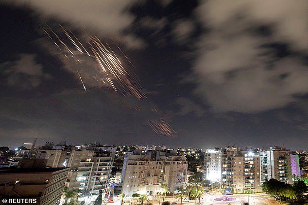 Israel faced a devastating salvo of about 180 ballistic missiles fire from Iran last night (picture are some of the missiles streaking down towards Israel)