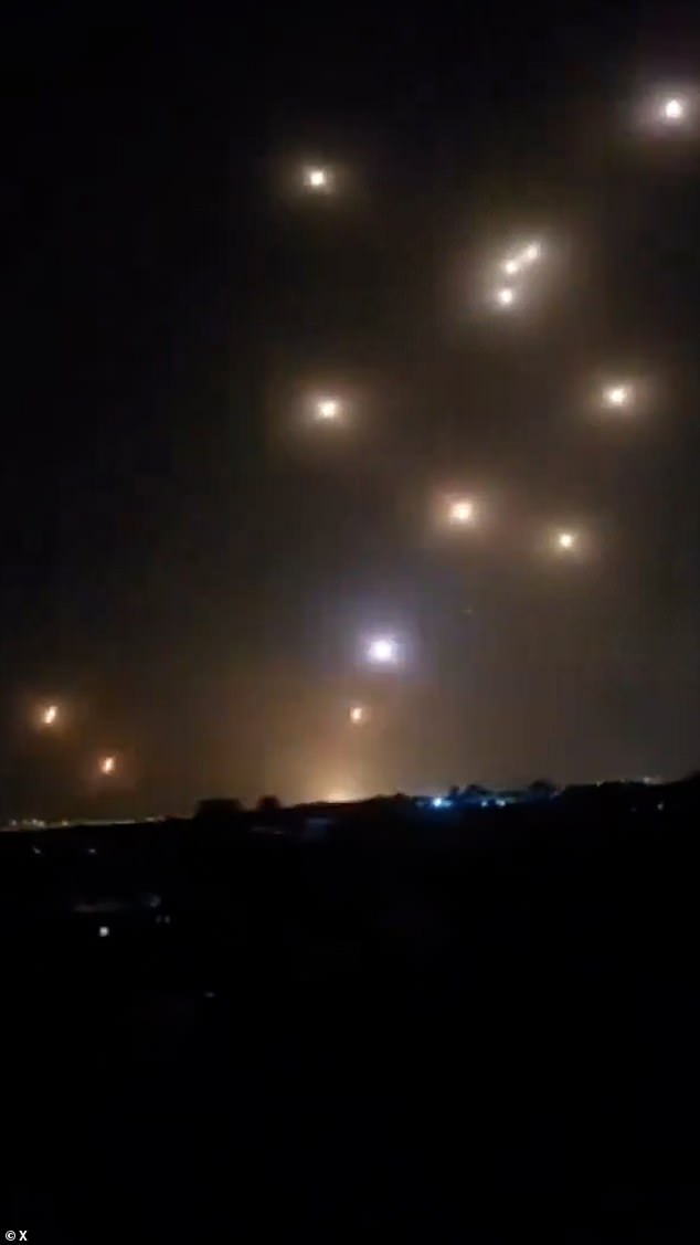 Stunned Israelis filmed the moment Iranian missiles slammed into the ground after breaching the country's air defences