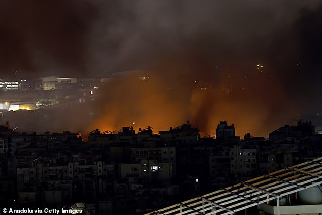 Smokes and flames rise over Dahieh area after attacks in the early hours of this morning