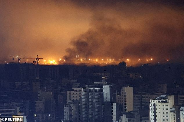 Smoke rises over Beirut's southern suburbs after a strike near Beirut-Rafic Hariri International Airport