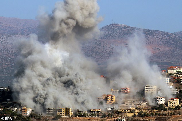 Smoke rises as a result of an Israeli airstrike on the village of Khiam near the border with Israel in southern Lebanon, 03 October 2024