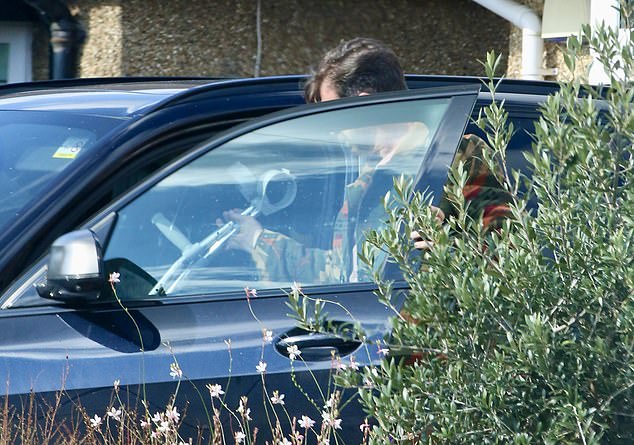 He looked somber as he stepped out in a patterned jacket and pink T-shirt, meanwhile his Strictly co-stars are on their way to the studios for Saturday's live show