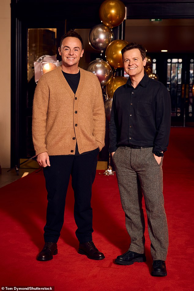 While Dec looked typically handsome in a smart button-up shirt and a pair of belted grey tweed trousers