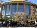 Voters line up outside the Bucks County Administration Building during early voting in the general election, Friday, Nov. 1, 2024, in Doylestown, Pa. (AP Photo/Michael Rubinkam)