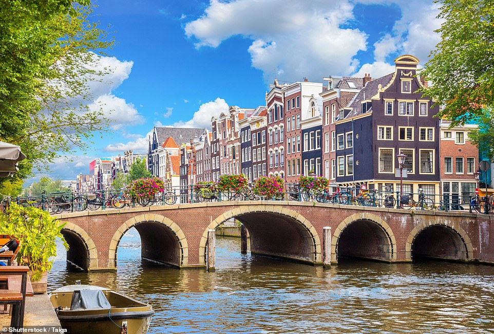 Holland.com claims that no visit to Amsterdam (above) is complete 'without having seen its beautiful, iconic canals'. Described as the 'symbol of the city', Amsterdam's canal system is a UNESCO World Heritage site and the tourism board explains that each of the Dutch capital's canals is 'unique and has its own charm'