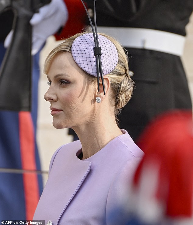 The former Olympian swimmer, 46, who is married to the principality's ruler Prince Albert, began Monaco's important day with a mass in the cathedral