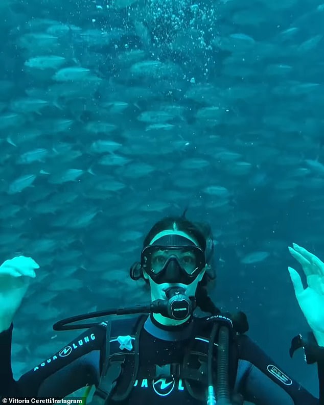 Vittoria - who boasts 1.8M Instagram followers - showed off her impressive scuba-diving skills in a video of her surrounded by fish