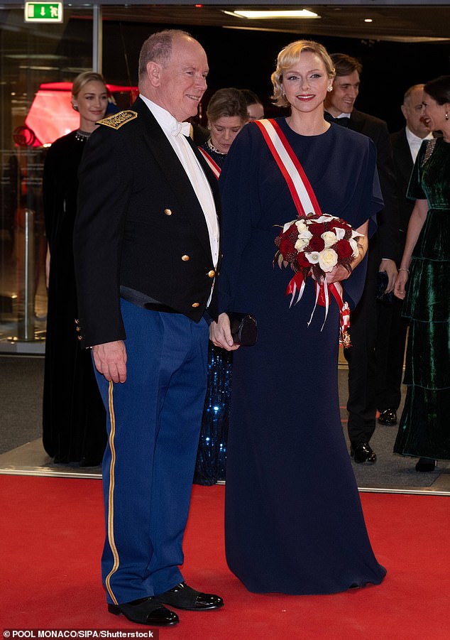 Princess Charlene was effortlessly elegant in a navy gown as she attended a lavish gala to celebrate National Monaco Day with her husband Prince Albert this evening