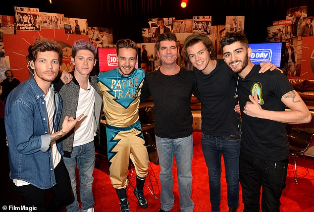 Simon Cowell was the music mogul behind Liam Payne's boyband One Direction (Pictured together in 2013)