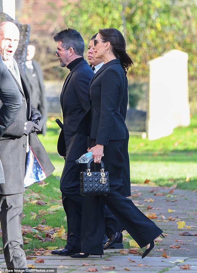 Cowell arrived at the funeral with his partner Laura Silverman