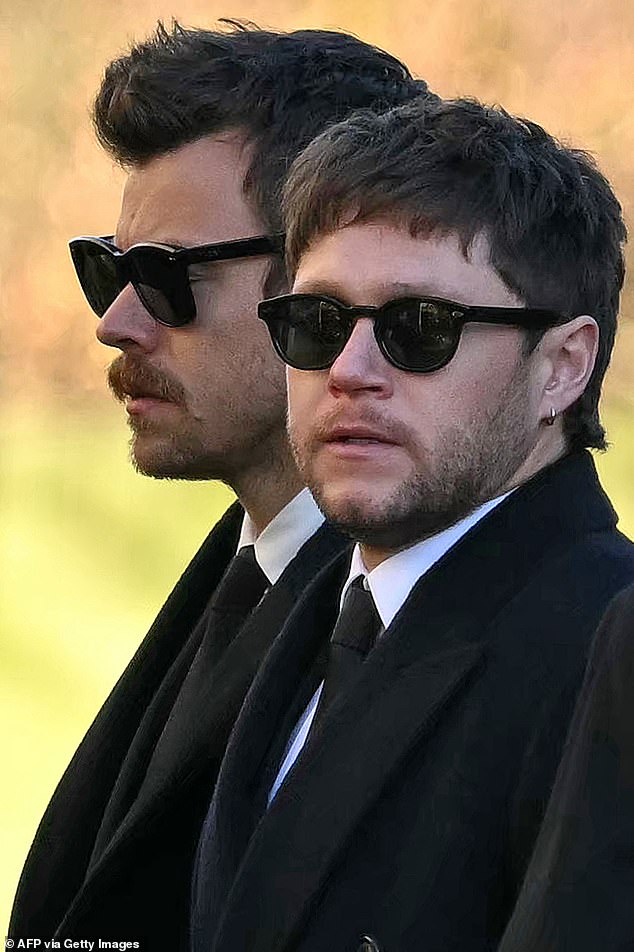 Former One Direction band members Harry Styles (left) and Niall Horan leave after attending the funeral service of the late One Direction singer Liam Payne