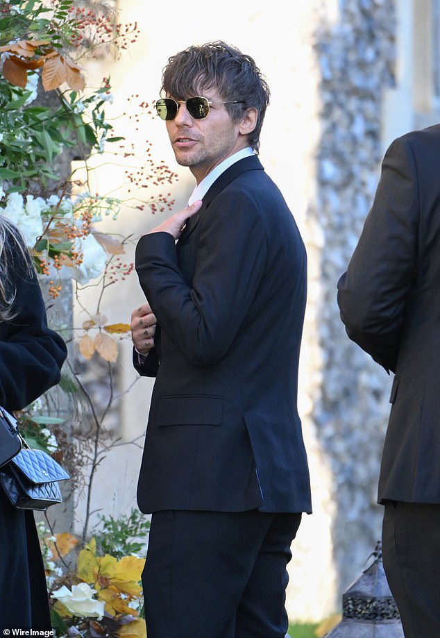 Louis Tomlinson attends the funeral for his fellow One Direction bandmate