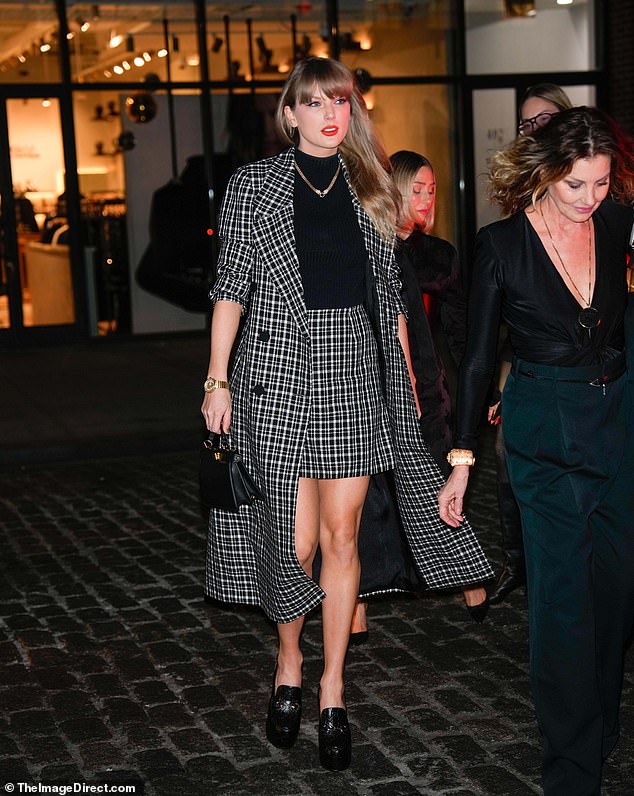 The songstress enjoyed a girls' night out with none other than country legend Faith Hill at the private, members-only club Chez Margaux in New York City on Tuesday night