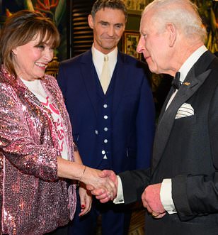 Charles' solo night at the Royal Variety Performance: Beaming King laughs with Elton John