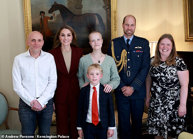 The Prince and Princess of Wales met young photographer Liz Hatton and her family (pictured) at Windsor Castle in October