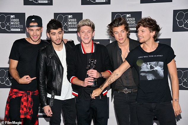 Following Liam's unexpected death aged 31 after falling from the third floor of his hotel balcony in Buenos Aires last month, Zayn announced he was postponing the US dates of his tour (One Direction pictured in 2013)