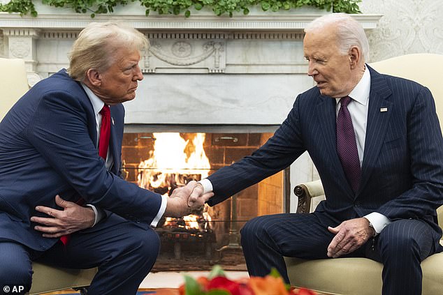 President-elect Donald Trump (left) shakes hands with President Joe Biden (right) during their Oval Office meeting on November 13. The transition had been held up because Trump's team refused to sign three MOUs with the federal government