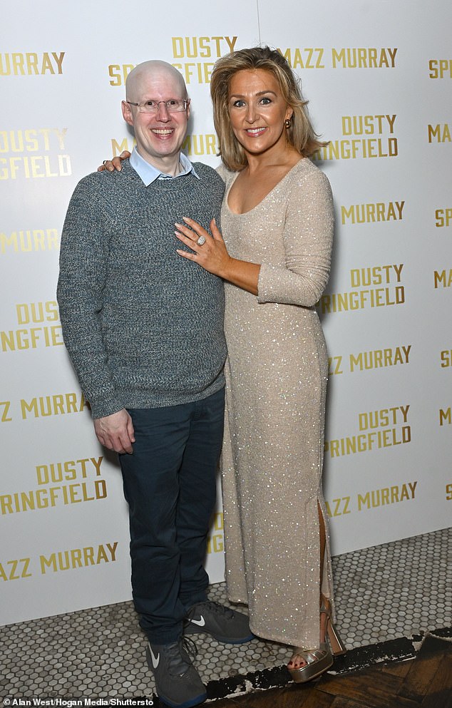 Mazz completed her look with a pair of gold drop earrings and a large silver ring as she struck up a smile for the cameras alongside Matt Lucas