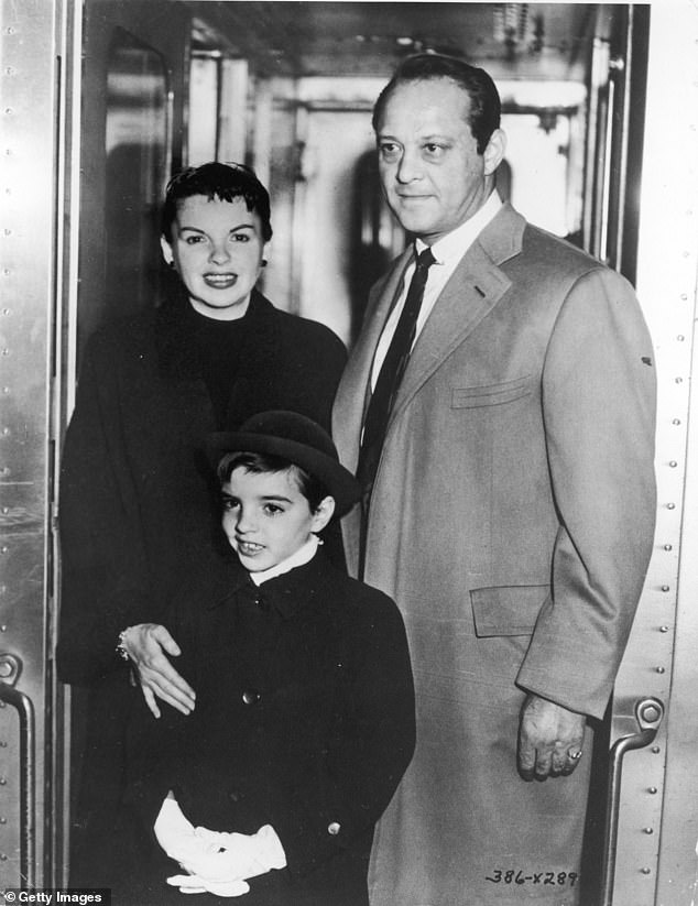 Pictured: Sidney Luft, Judy, and her daughter Liza Minnelli at the premiere of the film 'A Star is Born,' in which Garland starred and Luft produced