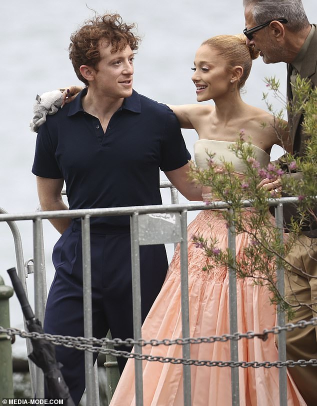 Ariana Grande and boyfriend Ethan Slater are pictured hugging as they leave a Wicked photocall in Sydney