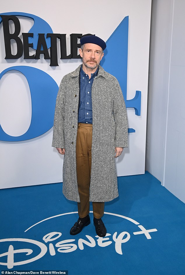 Martin Freeman cut a quirky figure in a blue beret, a dark blue denim shirt and beige chino trousers