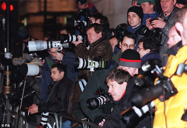 The photographers were stacked up three deep for the royal photocall, which featured on all of the front pages the following day