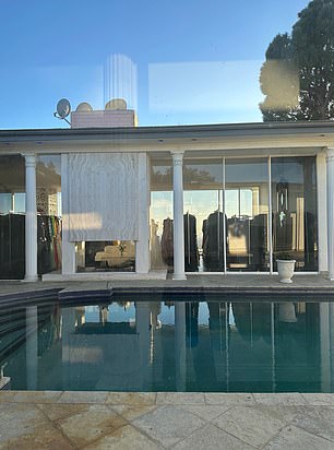 A beautiful pool overlooks the valley