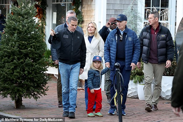 President Joe Biden announced on the tail-end of his Thanksgiving vacation on Sunday evening that he is pardoning his son Hunter Biden, 54, for his three felony charges. Pictured: Hunter Biden, son Beau Biden, wife Melissa Cohen Biden and President Biden grab lunch at the Brotherhood of Thieves restaurant on Nantucket island on November 29