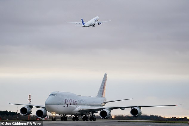 The plane carrying the Emir of Qatar arrives at Stansted Airport in Essex today