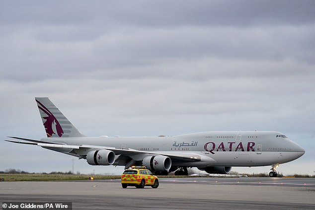 The plane carrying the Emir of Qatar arrives at Stansted Airport in Essex today