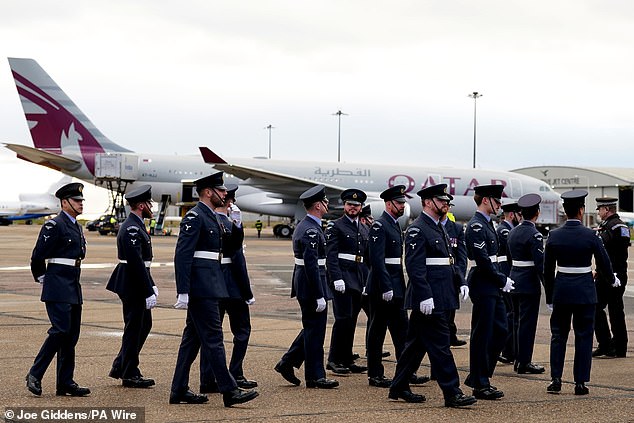 Members of the RAF await the arrival of the Emir of Qatar at Stansted Airport today