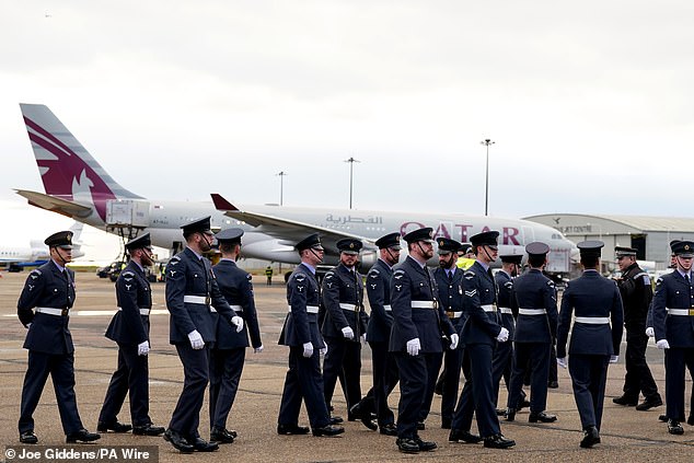 Members of the RAF await the arrival of the Emir of Qatar at Stansted Airport today