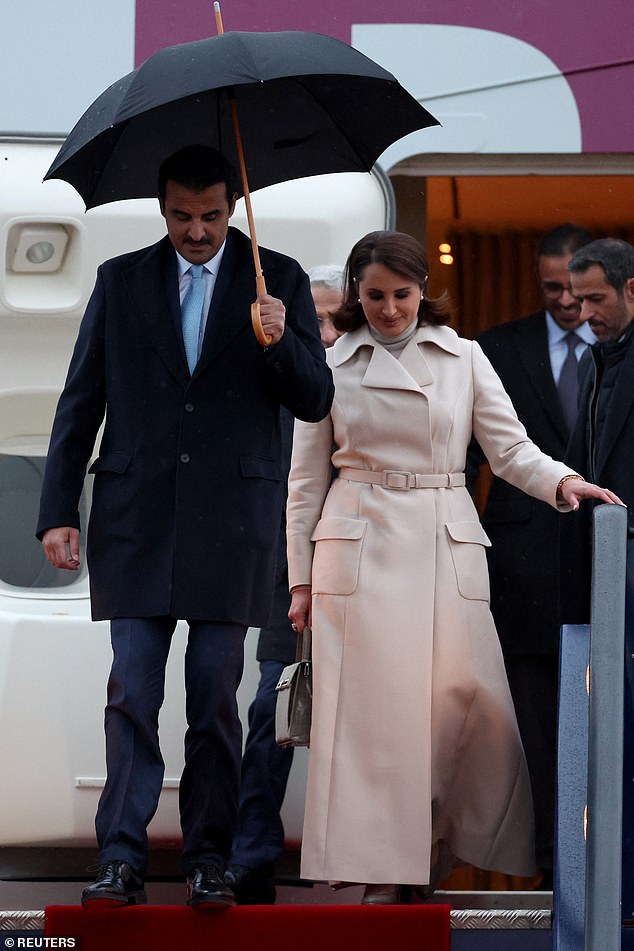 The Emir of Qatar, His Highness Sheikh Tamim bin Hamad Al Thani, with his first wife - and second cousin - Sheikha Jawaher bint Hamad Al Thani, arrive at Stansted Airport today