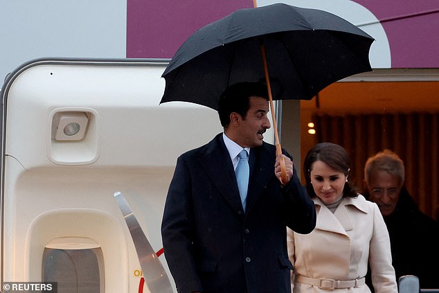 The Emir of Qatar and his wife arrive at Stansted Airport in Essex today for the state visit