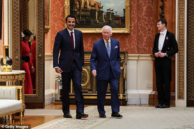 The Emir of Qatar and King Charles III arrive to view the Qatari items at Buckingham Palace