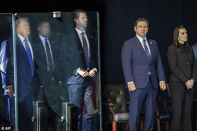 DeSantis (pictured with Donald and Eric Trump earlier today) - who ran against Trump in the Republican Primary before dropping out - could be the choice to replace Hegseth